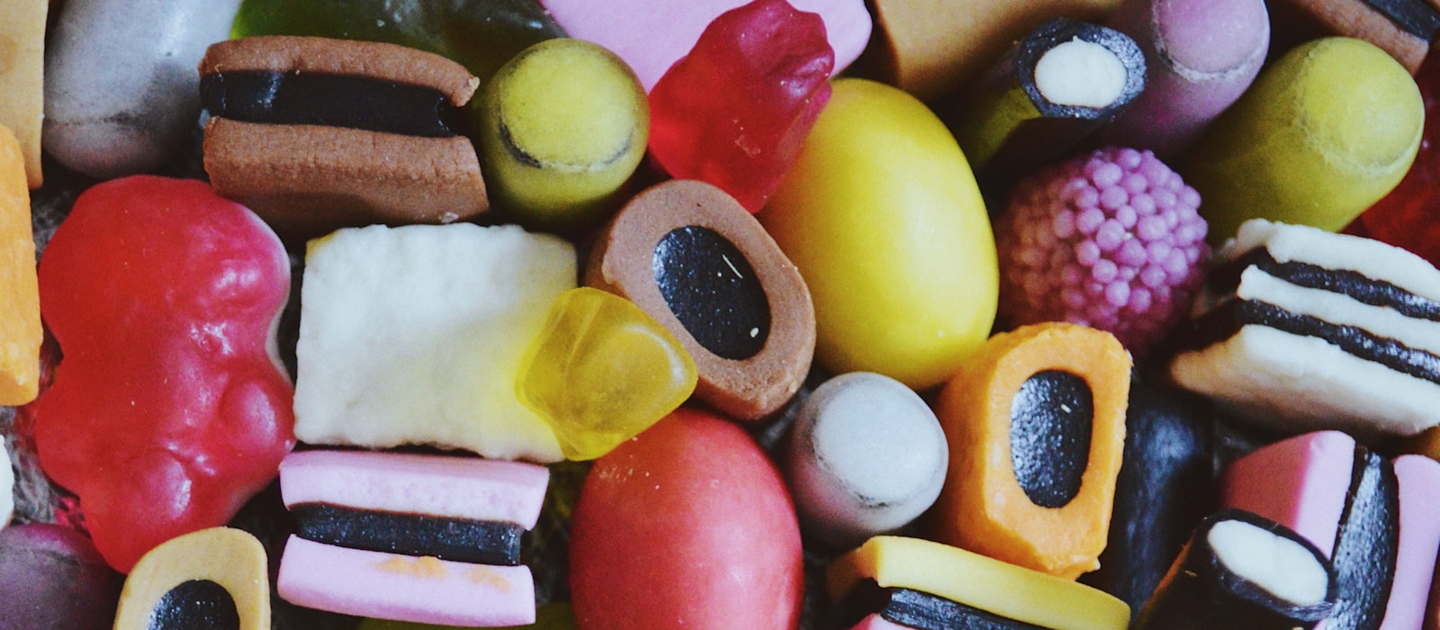 An assortment of different candies and gummies mixed together