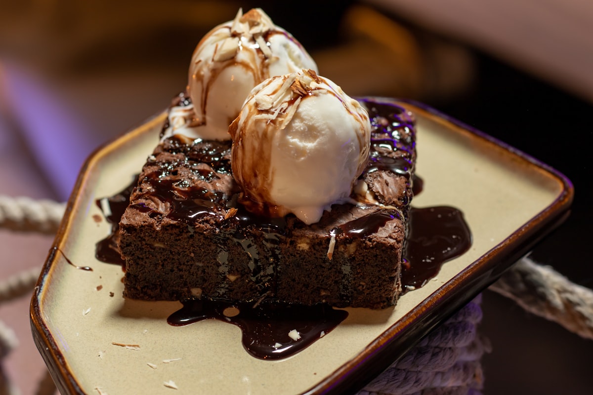 A tray of fudgy chocolate cannabis brownies cut into squares
