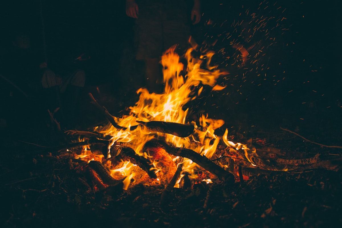 A campfire burning at night