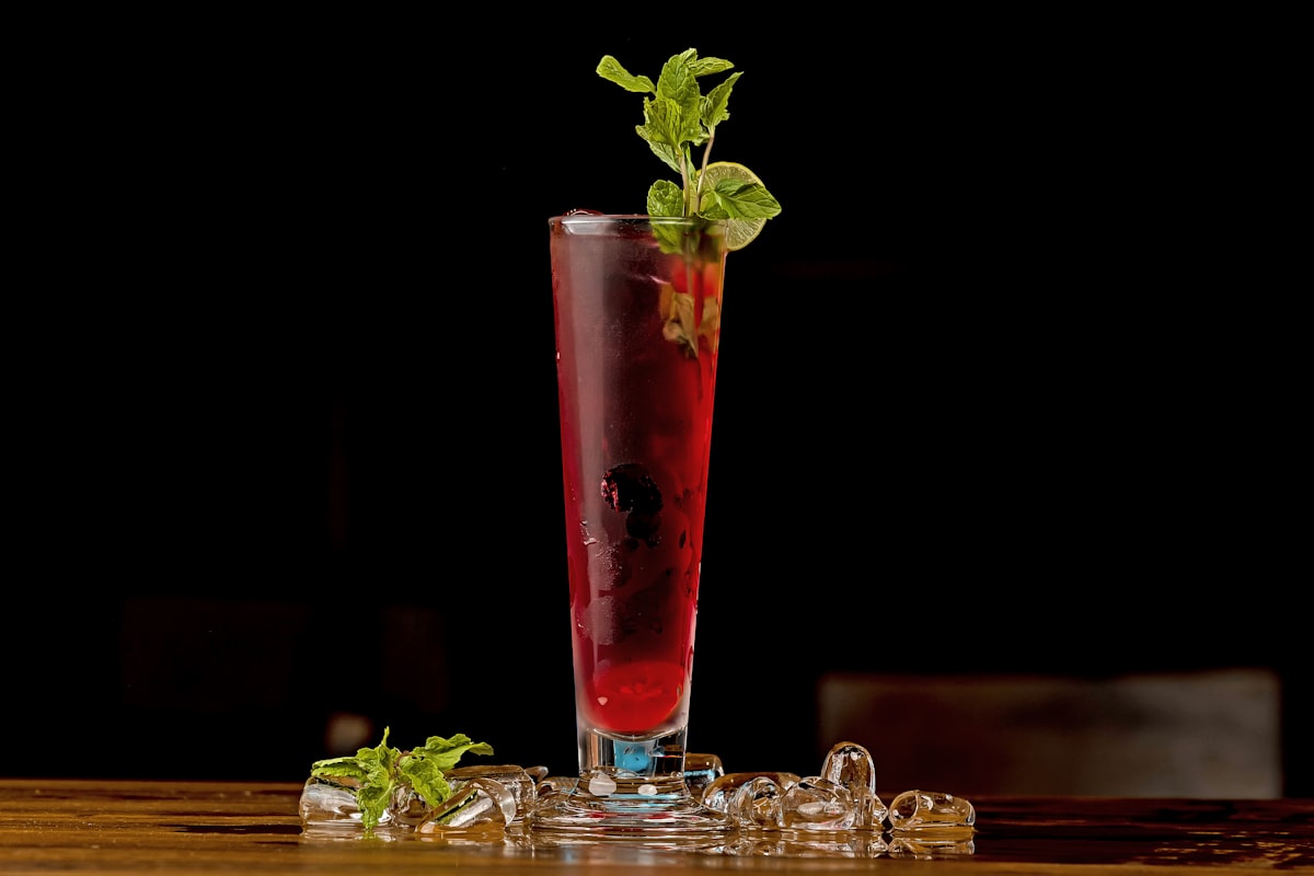 A sparkling strawberry mocktail garnished with mint